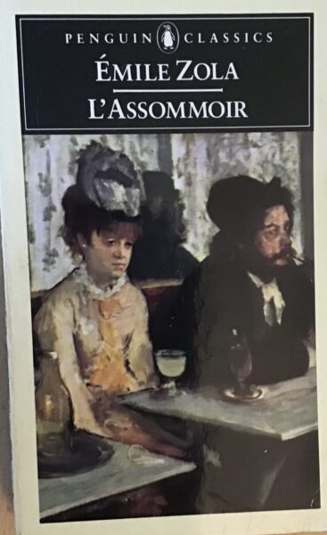 Detail from L'Absinthe by Degas, a couple sit at a table in a bar, the woman has a drink in front of her and wears a vacant sad expression